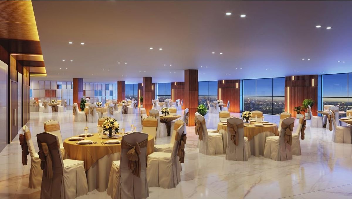 Clubhouse banquet hall with city views at Srijan Orizon